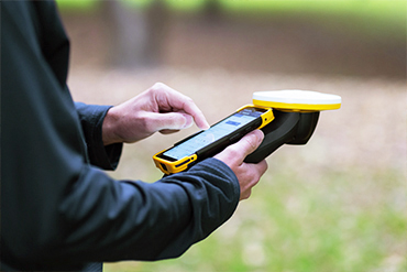 Trimble TDC6 mobile GIS data collector used outdoors
